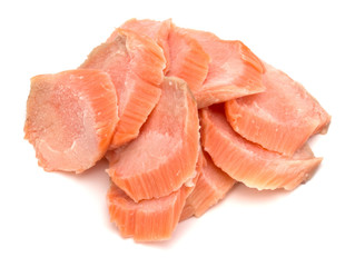 smoked salmon segments isolated on white background cutout. Prepared fish fillet fibres.