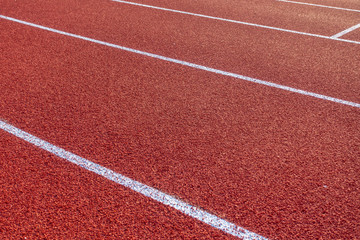 Fototapeta premium Red running track in stadium