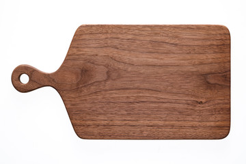 Handmade walnut chopping board. Walnut chopping board texture background.