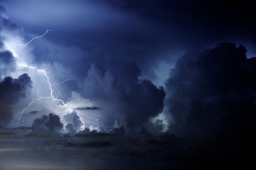 Low angle view of lightning in sky at night