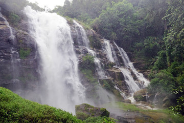 Beautiful waterfall with stones in forest, Thailand