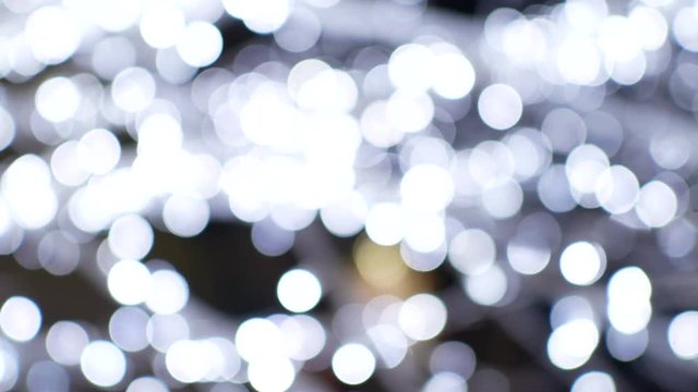 blurred bokeh light defocused background and textured for holiday ney year party and celebration background