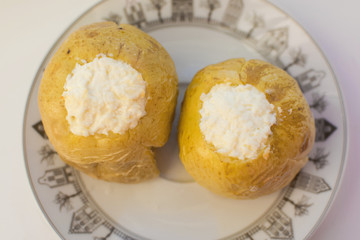 Apple with curd baked in the oven, closeup. Baked apples stuffed with cheesecake.