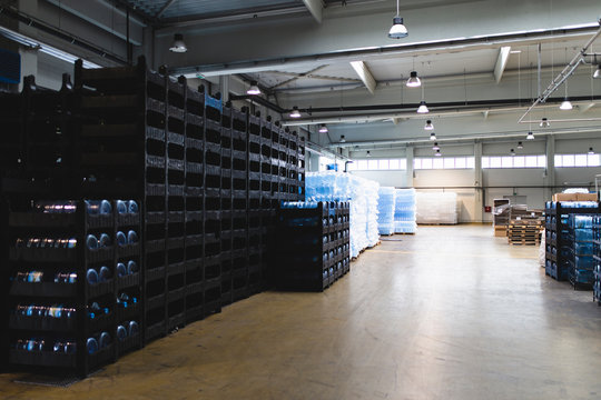 Crates of water bottles in warehouse