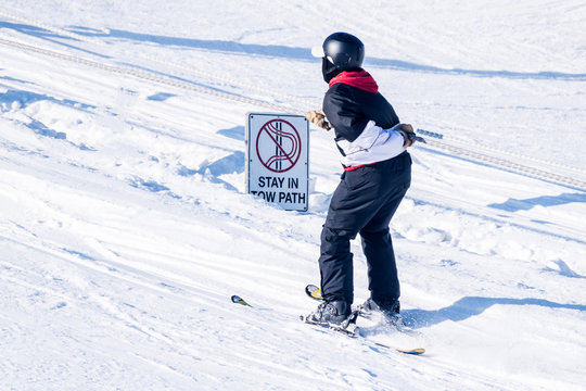 People are enjoying skiing	/ snowboarding	