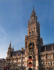 The Marian Column, Clock chimes and the tower of the New Town Hall in Munich, Germany