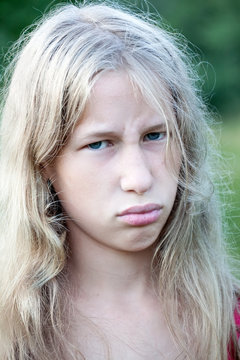 teen girl discontented face