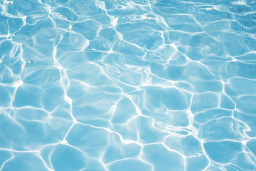 Fototapeta na wymiar Texture of water in swimming pool for background