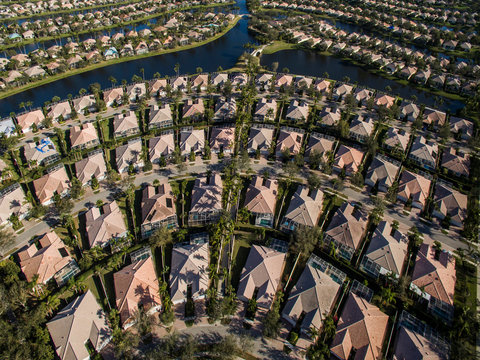 Aerial view of houses in row at city