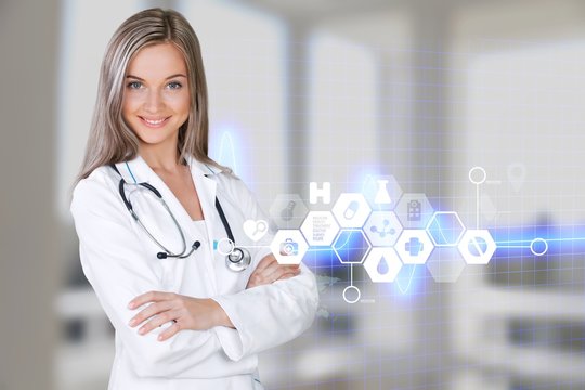 Female Doctor With Stethoscope In A White Coat Isolated On White