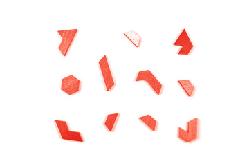 A hexagon tangram puzzle in Living Coral.