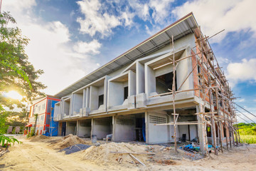Fototapeta na wymiar two storey houses are under construction in Thailand, modern house design.
