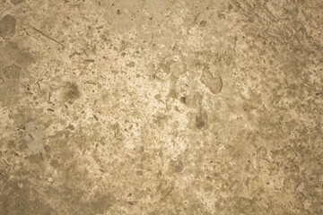 gray concrete surface with deep damage, bumps and scratches. rough texture.