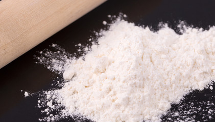 The white flour with a rolling pin
