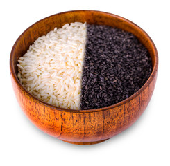 White and black rice in wooden bowl on white background.