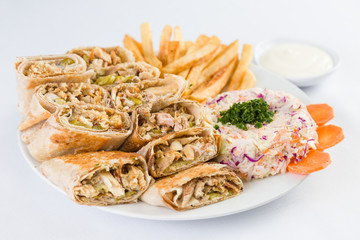 Arabic Chicken Shawerma with french fries and salad in Mediterranean Levantine  Cuisine