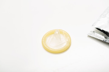 Condom on white background