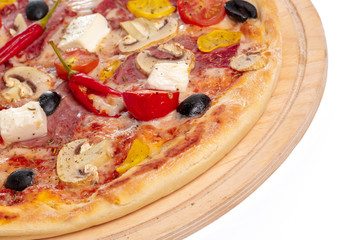 Italian fast food. Delicious hot pizza sliced and served on wooden platter isolated on white background