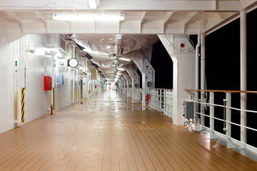 Deck of a cruise ship at night time