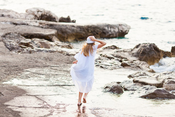 Walk on a deserted beach outdoors in the summer