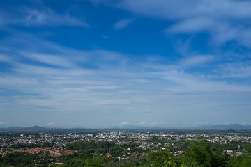 Fototapeta na wymiar Chiang Rai, Thailand downtown city skyline with blue sky white clouds