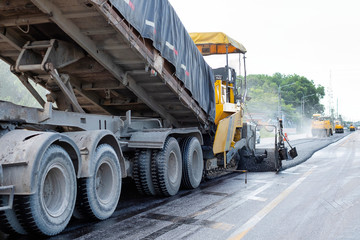 Asphalting  road construction in Thailan. Road machines and Equipments.