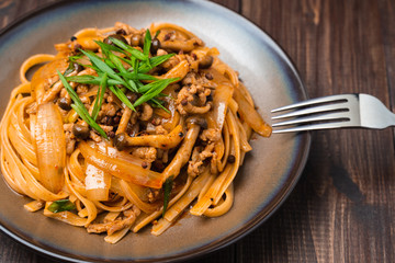 Fettuccine stir fry with Chinese sichuan pepper sauce with mince pork, mushroom and onion, Classic Chinese Italian Food Fusion Dishes
