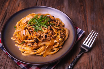 Fettuccine stir fry with Chinese sichuan pepper sauce with mince pork, mushroom and onion, Classic Chinese Italian Food Fusion Dishes