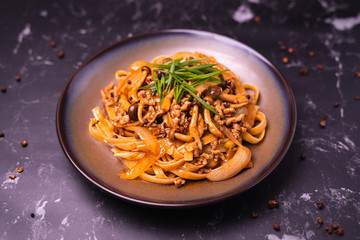 Fettuccine stir fry with Chinese sichuan pepper sauce with mince pork, mushroom and onion, Classic Chinese Italian Food Fusion Dishes
