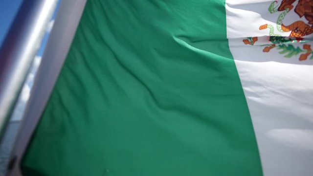 Mexican flag on a sailing boat