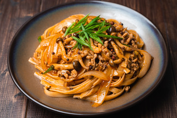 Fettuccine stir fry with Chinese sichuan pepper sauce with mince pork, mushroom and onion, Classic Chinese Italian Food Fusion Dishes