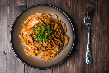 Fettuccine stir fry with Chinese sichuan pepper sauce with mince pork, mushroom and onion, Classic Chinese Italian Food Fusion Dishes