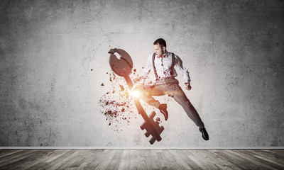 Breaking through access concept with furious man in room crashin