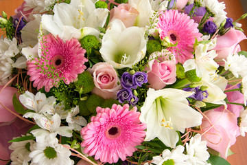 bouquet of flowers pink roses, white chrysanthemums, light striped Alstroemeria, gerberas close-up