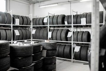Inerior view of the warehouse wiith new car tires