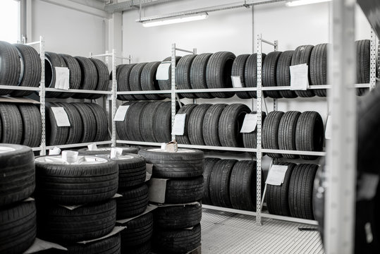 Inerior view of the warehouse wiith new car tires