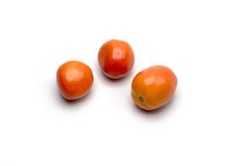 three tomato isolated whit white background