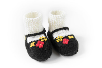 Wool Baby Slipper. Traditional homemade booties hand-stitched with red and yellow flower decorations and a bee