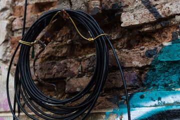 Electricity cables on a old building