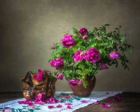 Still life with beautiful bouquet of wild roses