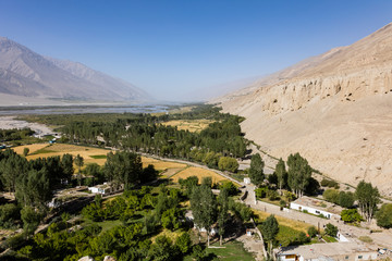 Fertile Wakhan Valley near Vrang in Tajikistan. The mountains in the background are the Hindu Kush in Afghanistan