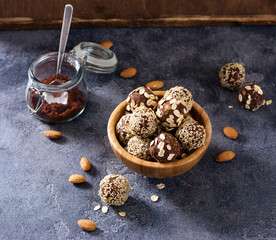 Vegan raw energy balls snack with nuts and cocoa, healthy sweets, sugarfree, clean eating
