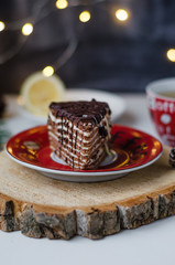 chocolate cake with hot tea and lemon