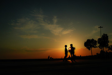 Fototapeta na wymiar silhouette of a man at sunset