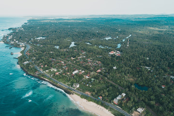 Aerial view of beautiful tropical coastline and fisherman village