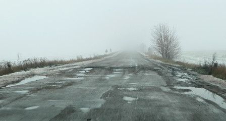 Damaged road, road pits