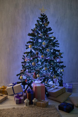 Christmas tree with presents, Garland lights new year winter home decoration