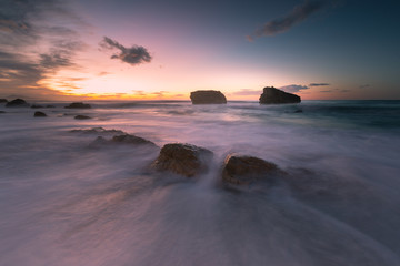Obraz premium Sea hitting the rocks of Ilbarritz coast at the city of Biarritz, Basque Country,.
