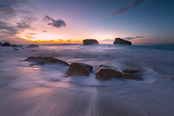 Obraz premium Sea hitting the rocks of Ilbarritz coast at the city of Biarritz, Basque Country,.