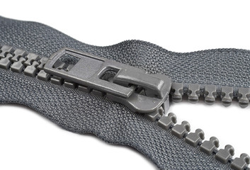 plastic zipper for sewing on a white background © SERGIYVOLODYMYROVYCH